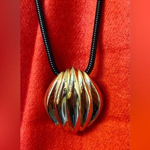 CCi necklace, goldtone pendant w/black metal chain